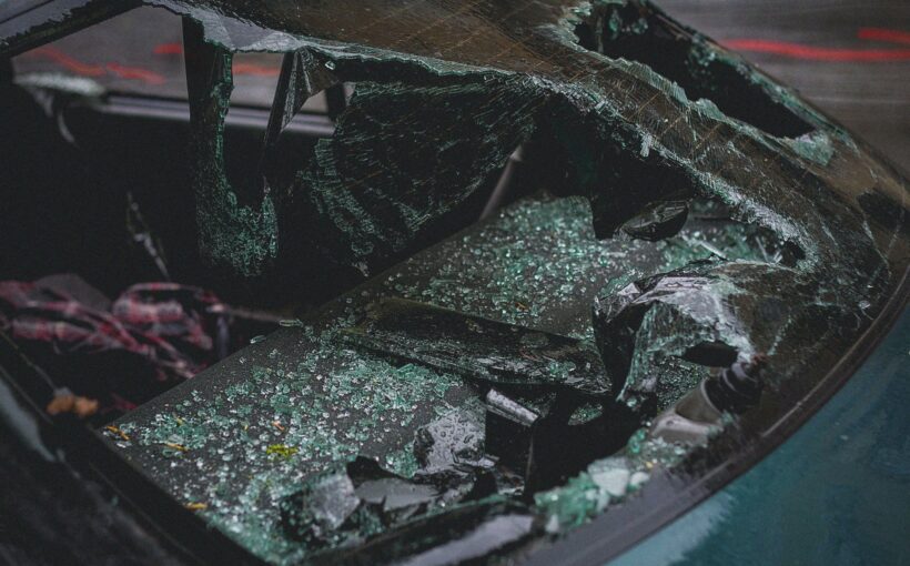 a broken windshield of a car