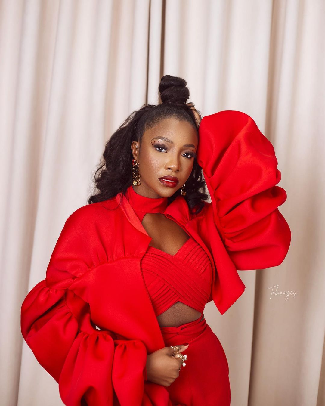 We Are Crushing Hard on Ini Dima-Okojie’s Red Look to The “Blood Sisters” Premiere