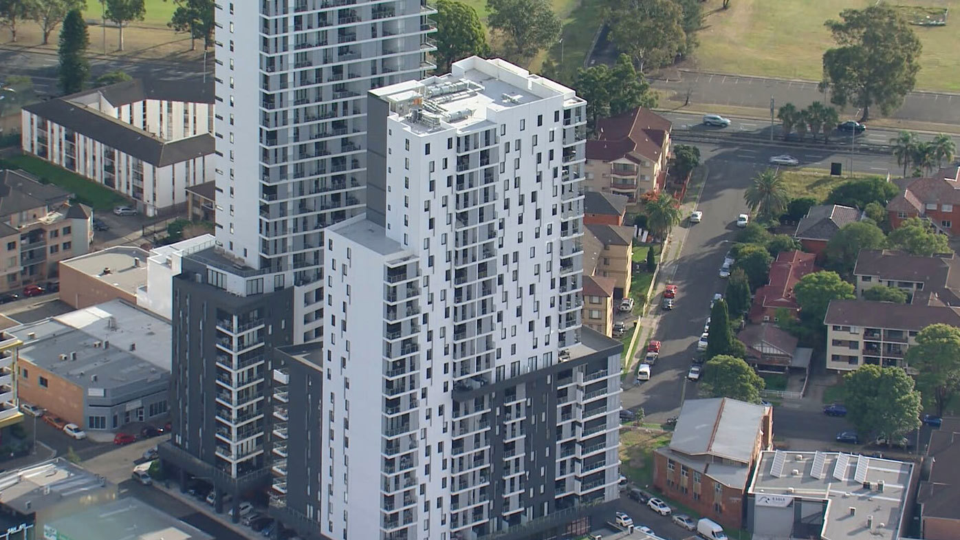 Sydney woman found dead inside huge tower 20 hours after anonymous call to police