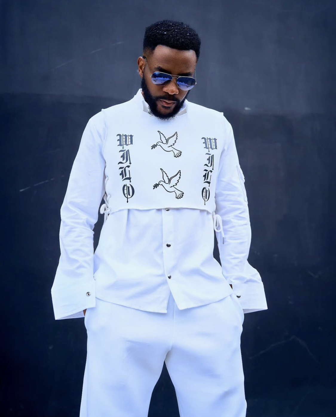 Ebuka Stuns In All-White Millennial/Gen-Z Ensemble At The #BBNaija Level Up Reunion Show