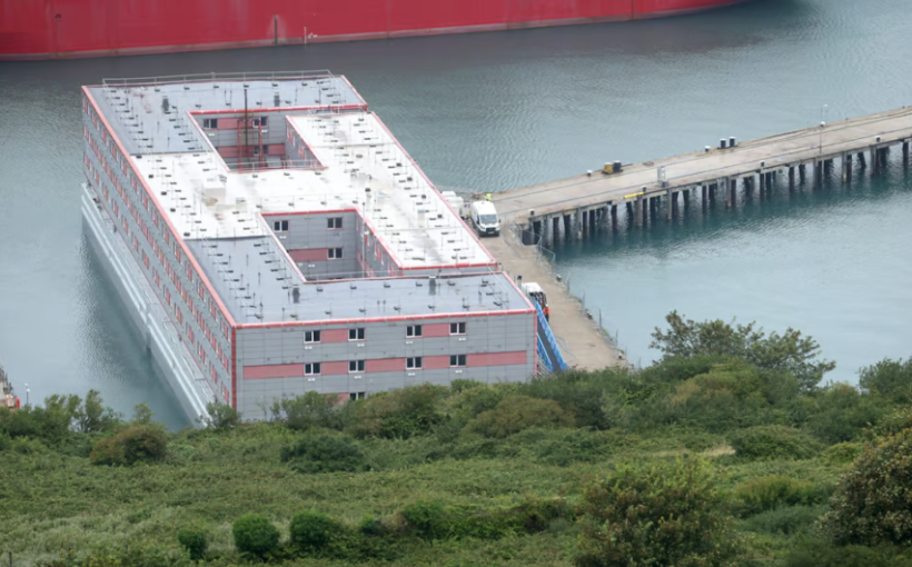 Asylum seekers moved off controversial UK barge after deadly bacteria found in ship’s water