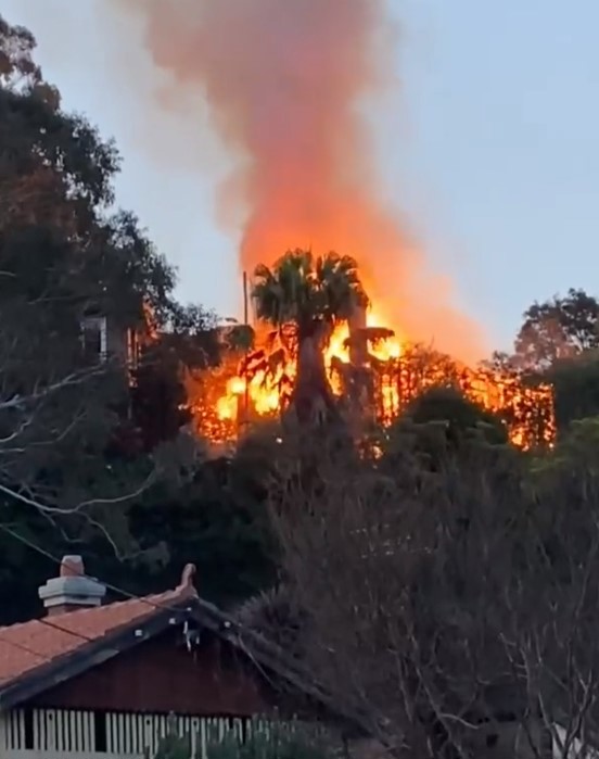 More than 70 calls to triple zero as Sydney home becomes engulfed in flames