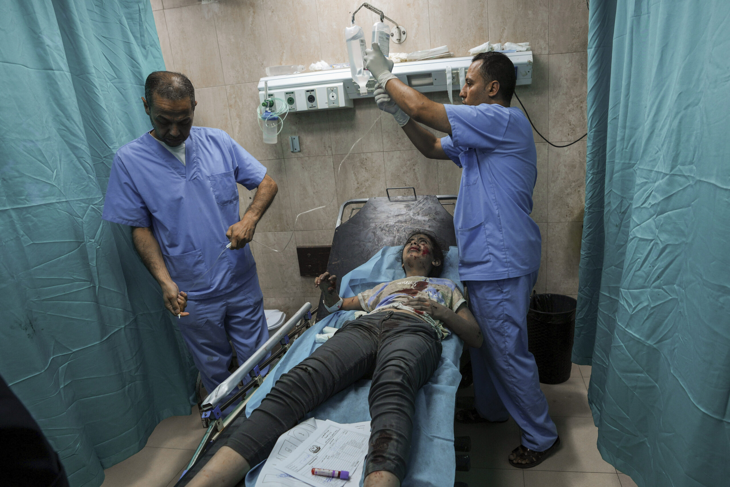 Aid stuck at Gaza-Egypt border as Israeli siege strains hospitals, water supply