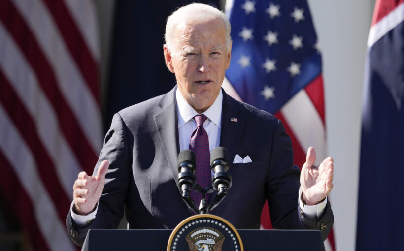 Biden warns of response if Iran attacks US troops