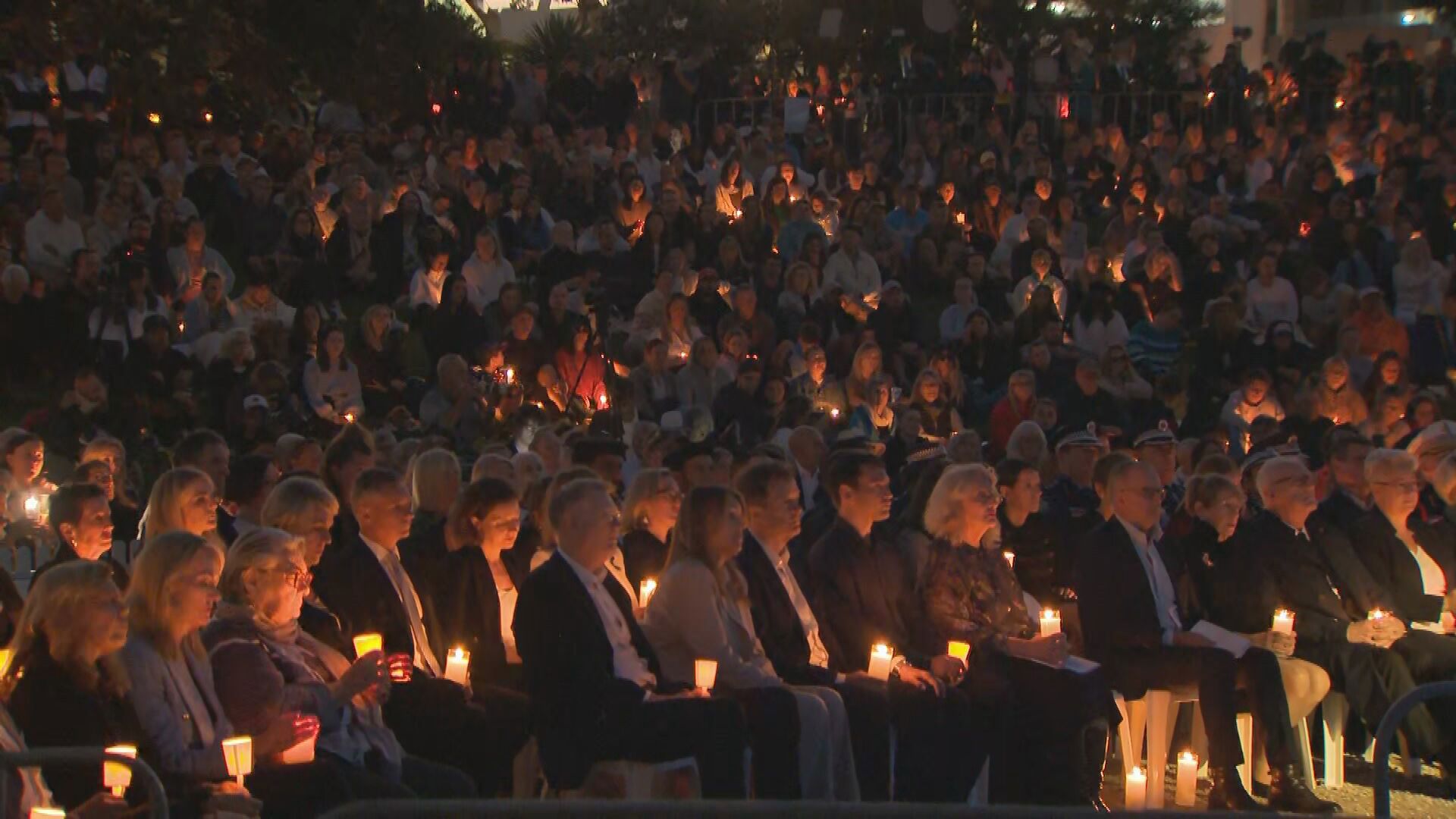 Thousands gather for sombre vigil to honour Bondi stabbing victims