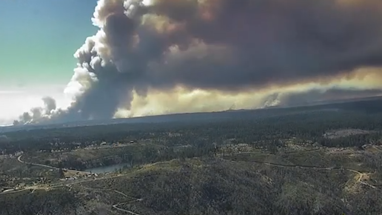 Time-lapse video captures ‘fire-whirl’ as blazes burn thousands of acres across US, Canada