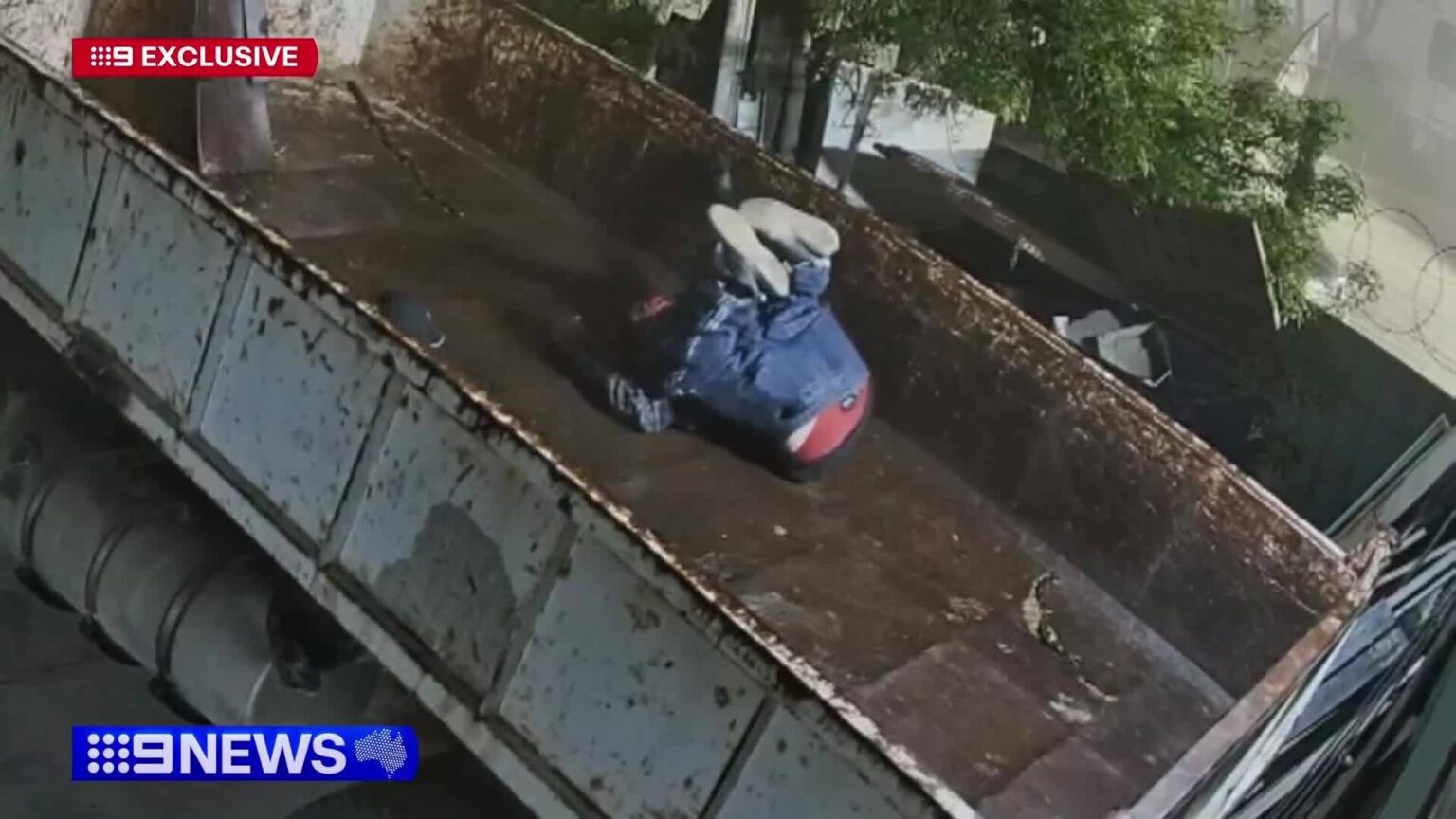 CCTV shows alleged intruder falling from roof in front of unsuspecting ...