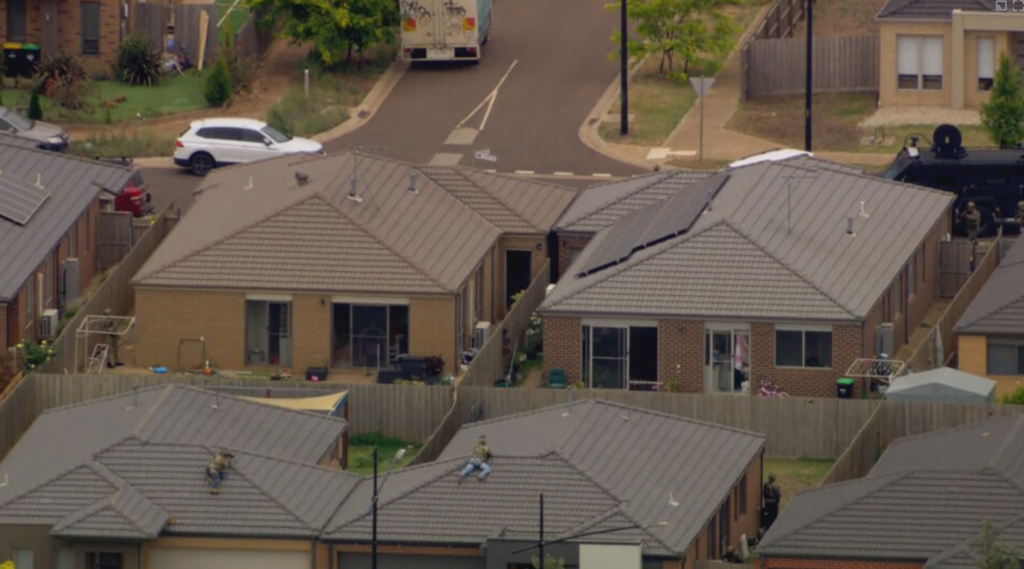 Man in custody after shots fired at officers, armed police swarm home ...