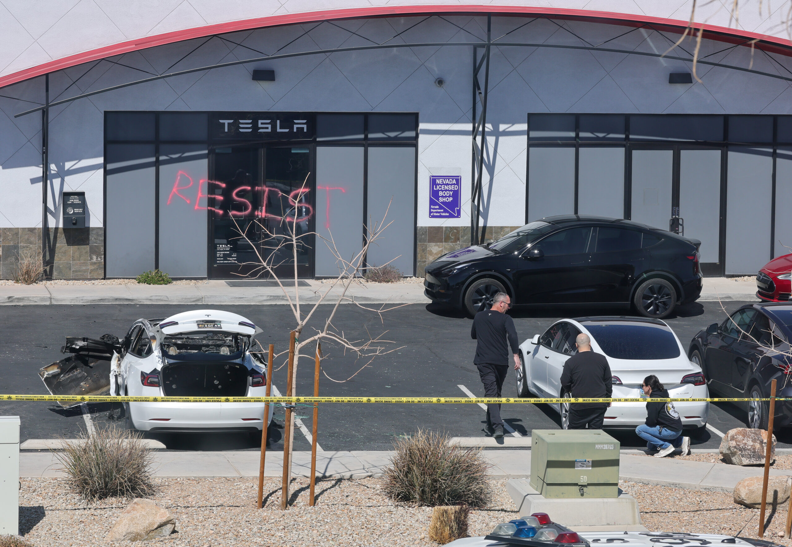 US attorney general re-announces ‘severe’ charges against alleged Tesla arsonists