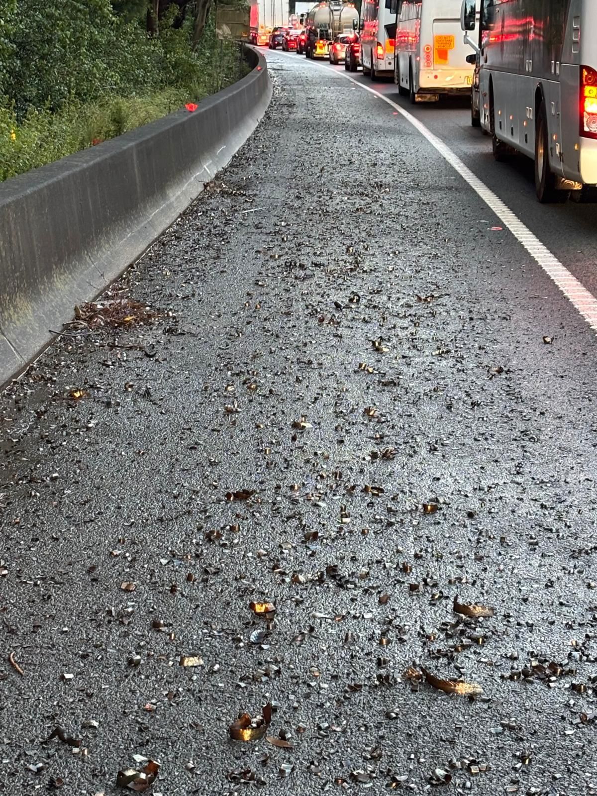 Truck driver charged after metal debris damages hundreds of cars on NSW motorway
