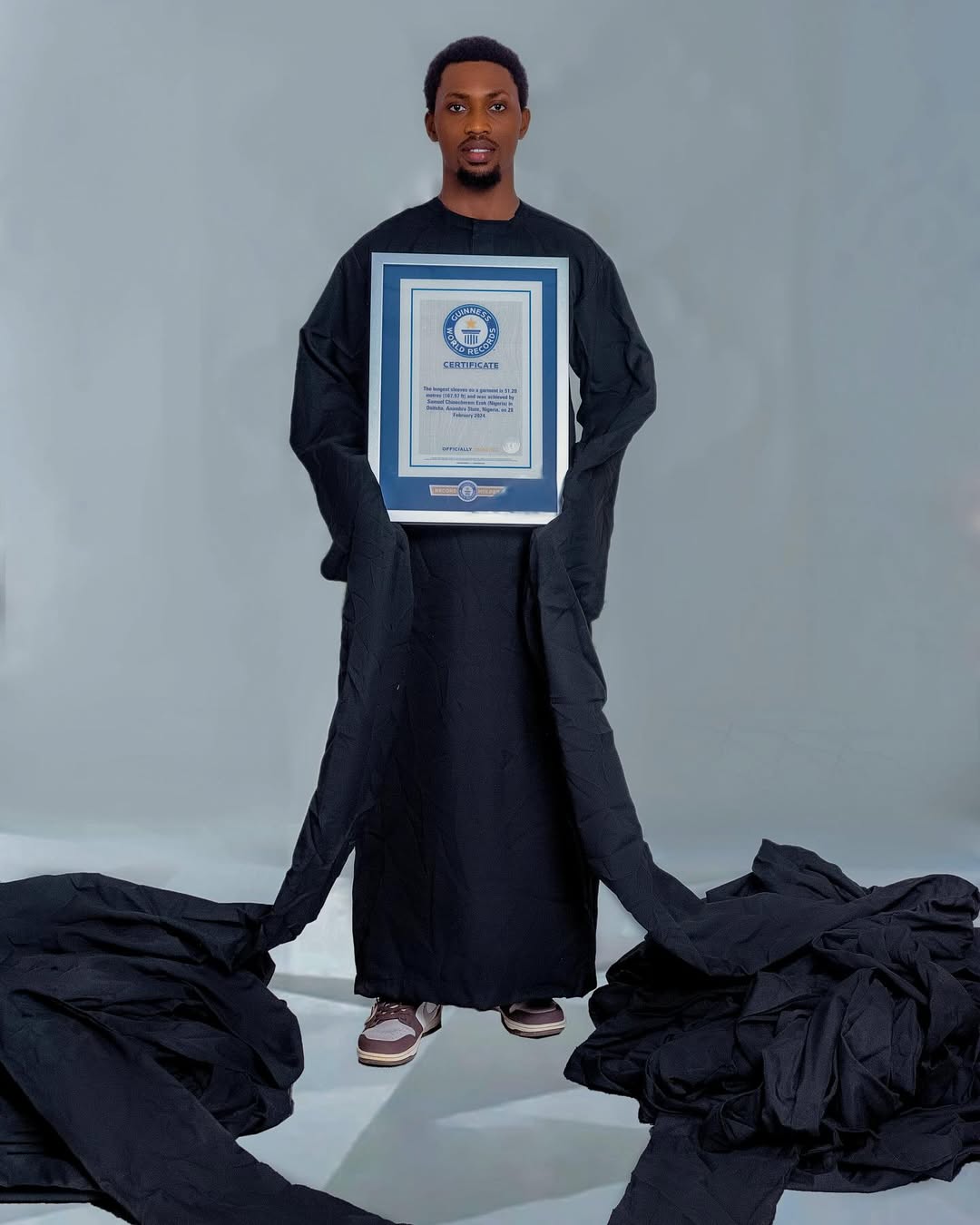 Samuel Chinecherem Ezeh’s 51-Metre Sleeves Earn Him a Guinness World Record